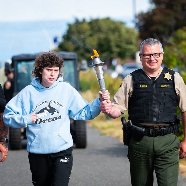 A small logo depicting the news story CLALLAM COUNTY TORCH RUN TOP FUND RAISER FOR SPECIAL OLYMPICS